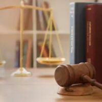 Legal items- gavel, scales of justice, legal books